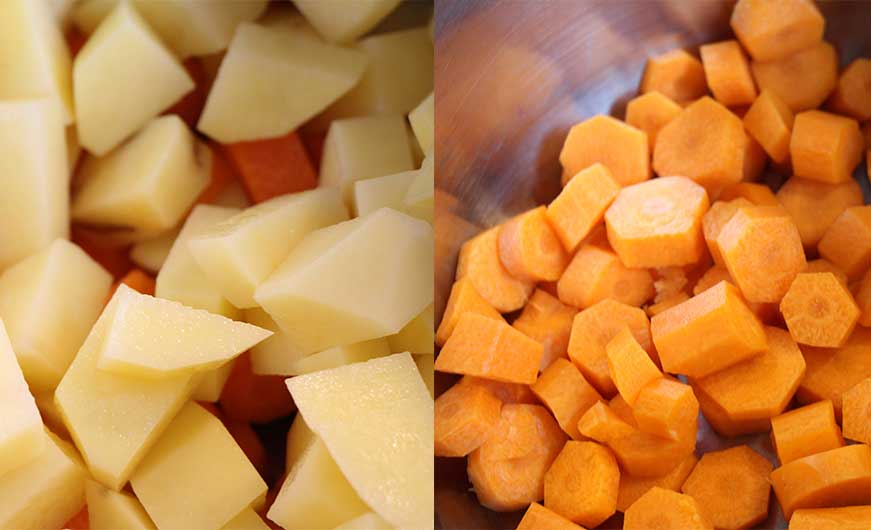 geschnittene Gemuesewürfel Karotte Kartoffel